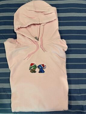 Light Pink Holiday Embroidered Hoodie Featuring Stitch & Baby Yoda